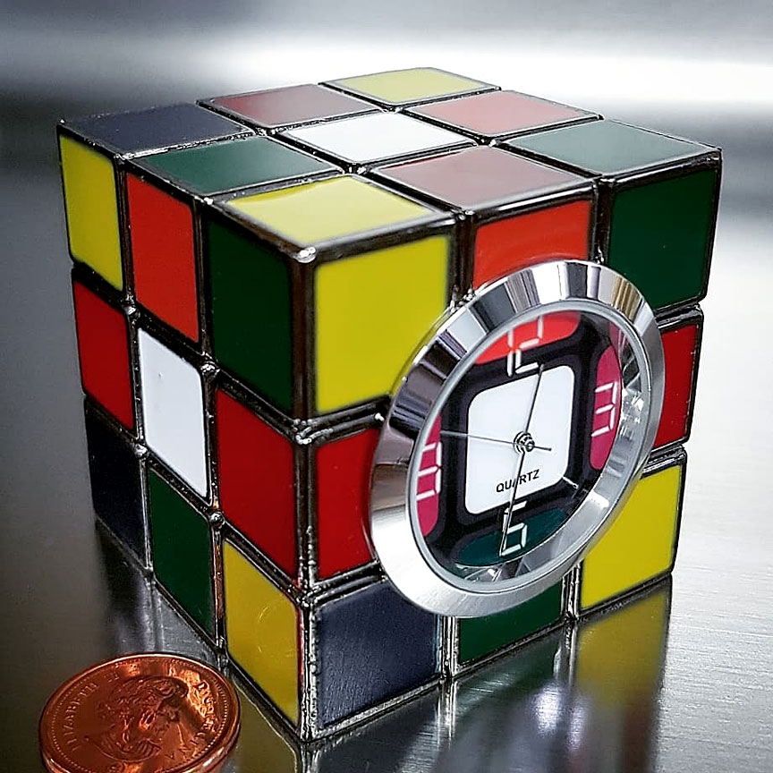 Часы cube. Кубик рубик клок. Клик клок кубик Рубика. Коллекционные кубики из Леголэнда. Язык головоломки Rubik's Clock.